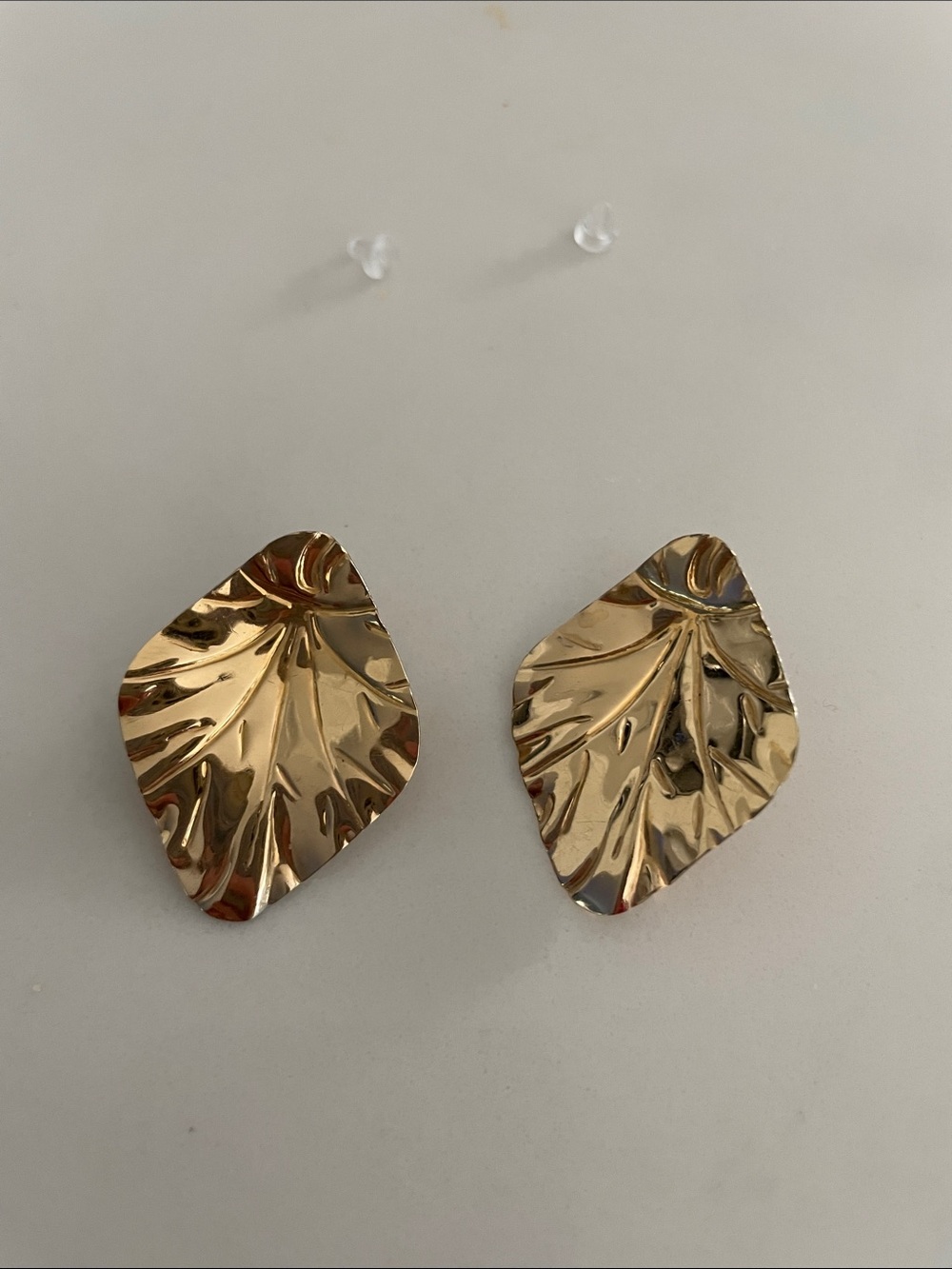 Gold tone Leaf Textured Statement Earrings. Post are 14kt gold stamped.